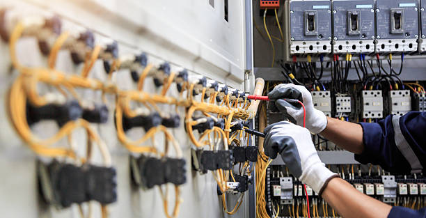 Professional Electrician technician working in Springville, IA